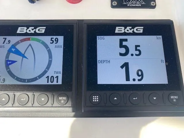 Slide: The Image of B&G marine instruments displaying wind angle, speed, and depth on a 2005 Beneteau 57 yacht. - 8
