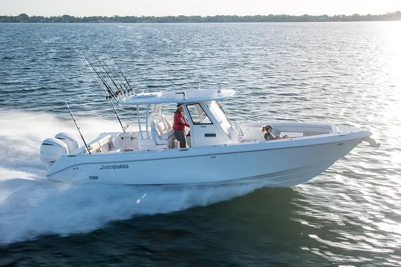 The Image of Manufacturer Provided Image: 2025 Everglades 335 Center Console boat cruising on open water. - 0
