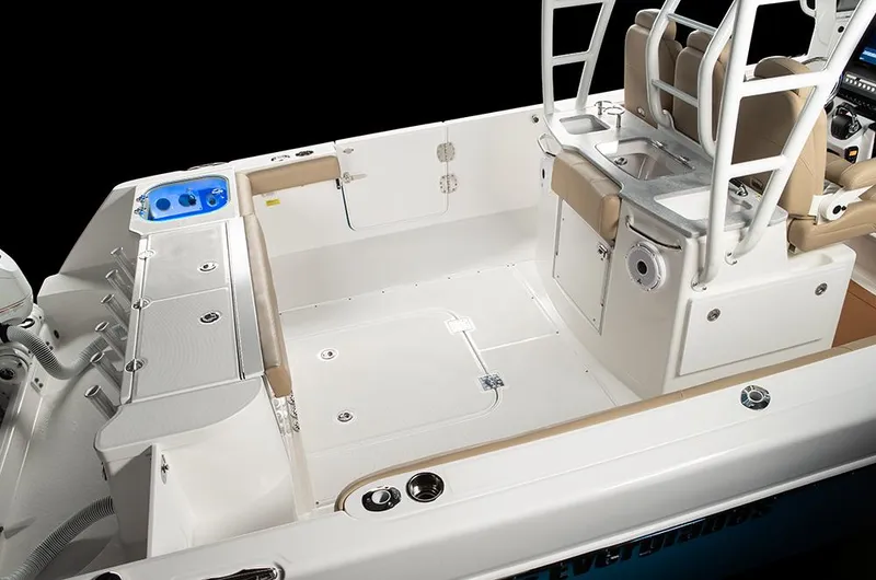 Slide: The Image of Manufacturer Provided Image: 2025 Everglades 335 Center Console boat interior with seating and storage. - 12