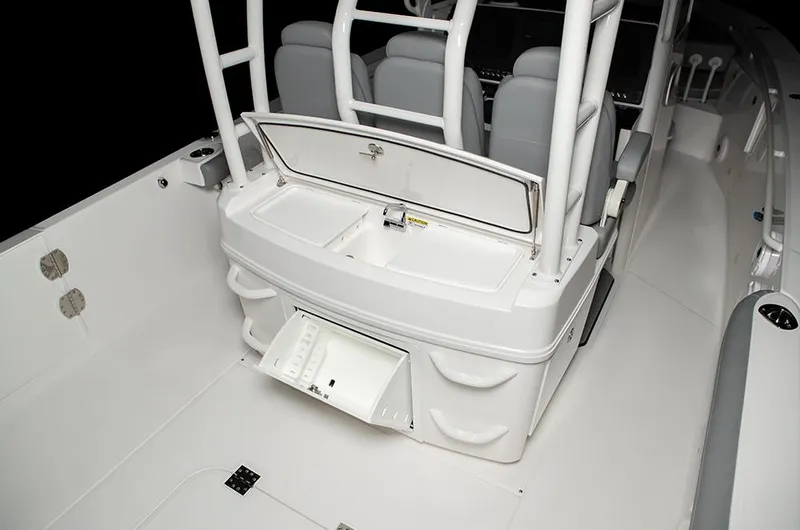 Slide: The Image of Manufacturer Provided Image: 2025 Everglades 335 Center Console boat interior with seating and storage compartments. - 9