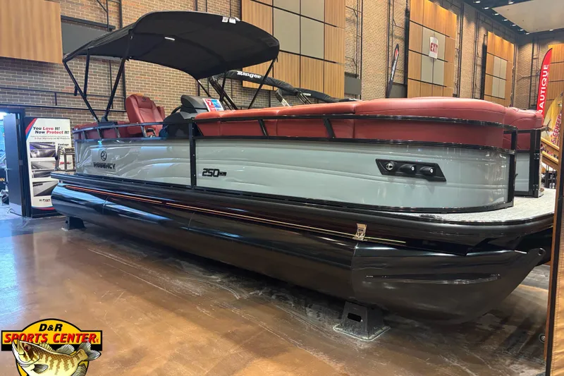 The Image of 2026 Regency 250 DL pontoon boat displayed indoors at D&R Sports Center. - 0
