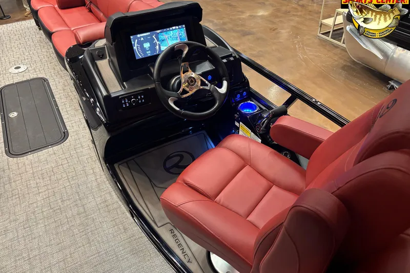 Slide: The Image of Luxurious 2026 Regency 250 DL boat interior with red seating and modern dashboard. - 4