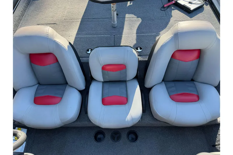 Slide: The Image of 2017 Tracker Pro Team 195 TXW boat seats with gray and red upholstery. - 8