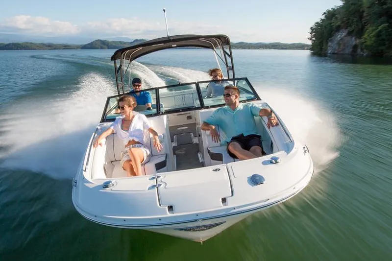 Slide: The Image of Manufacturer Provided Image: 2015 Sea Ray 290 Sundeck boat cruising with passengers on a lake. - 14