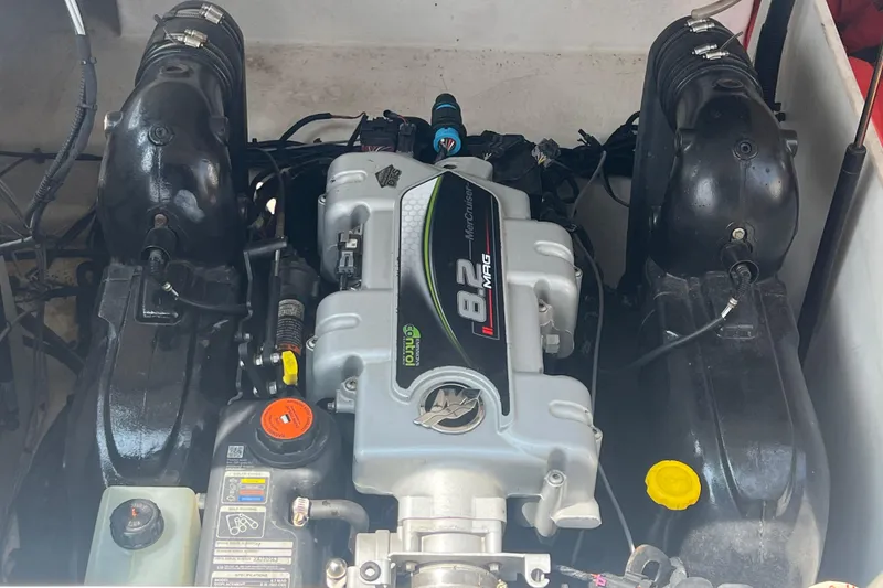 Slide: The Image of Engine of a 2015 Sea Ray 290 Sundeck boat, featuring MerCruiser 8.2 MAG. - 2