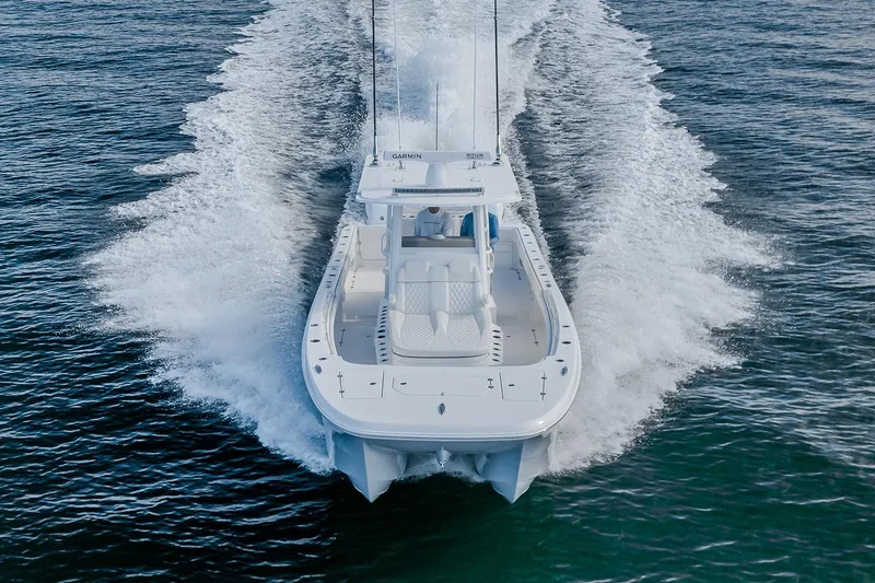 Slide: The Image of Manufacturer Provided Image: 2026 Invincible 33 Catamaran cruising on open water, showcasing sleek design and powerful performance. - 1