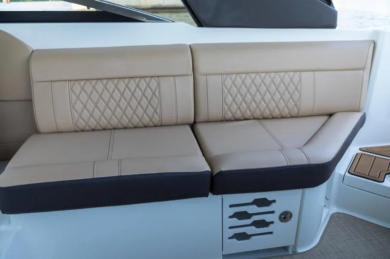Slide: The Image of Manufacturer Provided Image: 2019 Sea Ray SLX 280 beige leather seating with diamond stitching. - 20