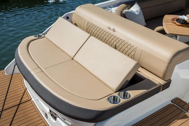 Slide: The Image of Manufacturer Provided Image: 2019 Sea Ray SLX 280 boat with luxurious tan seating and cup holders. - 22
