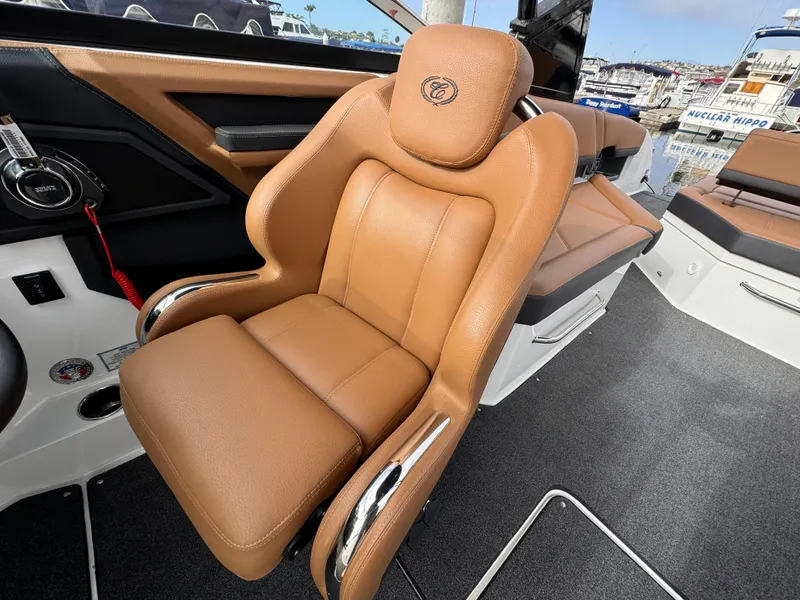 Slide: The Image of Luxurious tan leather seat in 2022 Cobalt R8 boat interior. - 10