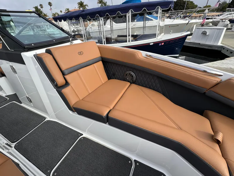 Slide: The Image of Luxurious seating on 2022 Cobalt R8 boat, featuring tan leather and sleek design. - 15