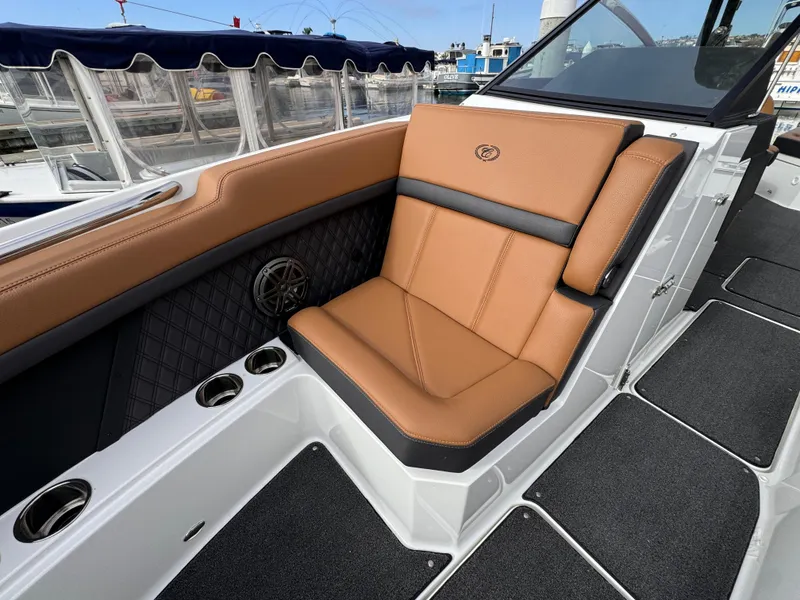 Slide: The Image of Luxurious seating on 2022 Cobalt R8 boat with tan upholstery and sleek design. - 17