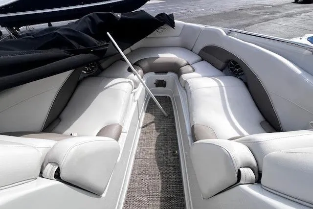 Slide: The Image of 2018 Crownline 275 SS boat interior with spacious seating and modern design. - 14