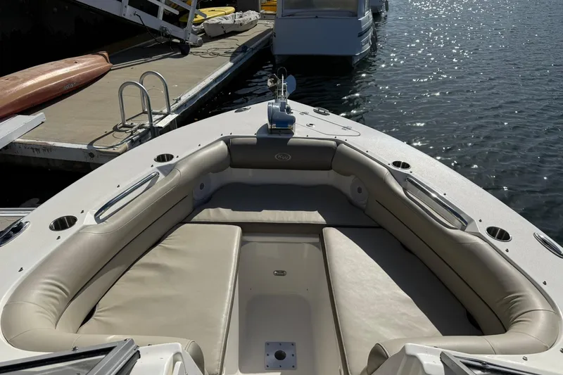 Slide: The Image of 2023 Key West 239 DFS boat with spacious seating at dockside. - 10