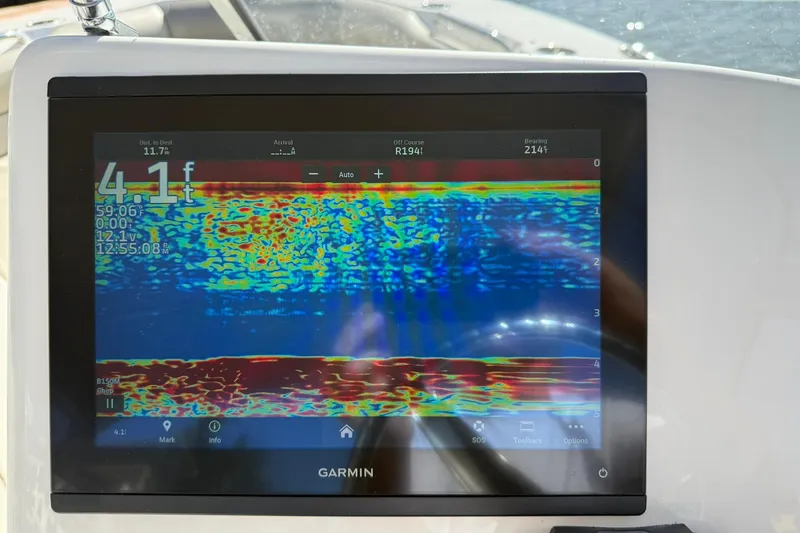 Slide: The Image of Garmin sonar display on 2023 Key West 239 DFS boat, showing depth and underwater details. - 19