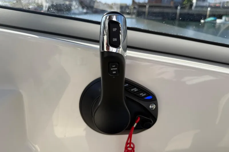 Slide: The Image of Throttle control of 2023 Key West 239 DFS boat, featuring speed and direction buttons. - 23
