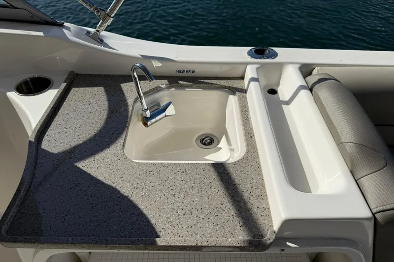 Slide: The Image of 2023 Key West 239 DFS boat sink with faucet and countertop detail. - 25