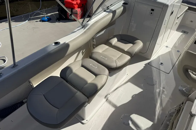 Slide: The Image of 2023 Key West 239 DFS boat interior with comfortable seating and modern design. - 26