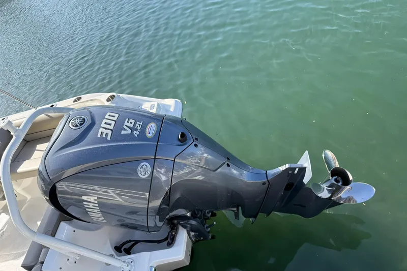 Slide: The Image of 2023 Key West 239 DFS boat with Yamaha 300 V6 outboard engine on water. - 32