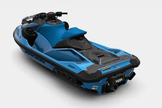 Slide: The Image of 2026 Sea-Doo RXP-X 325 jet ski in vibrant blue, rear view. - 3