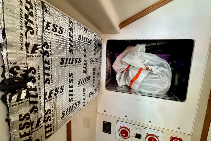 Slide: The Image of Soundproofing installation in a 2005 Catalina 42 MkII sailboat interior. - 23