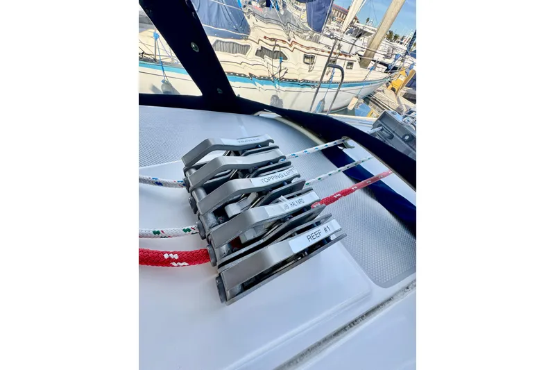 Slide: The Image of Sailboat control lines on a 2005 Catalina 42 MkII, docked at a marina. - 53