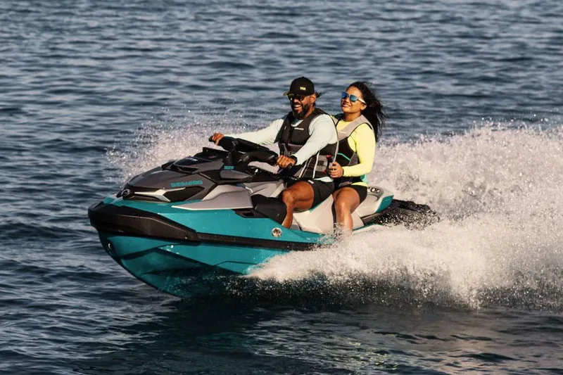 Slide: The Image of Manufacturer Provided Image: Two people riding a 2026 Sea-Doo GTX Limited 325 on open water. - 4