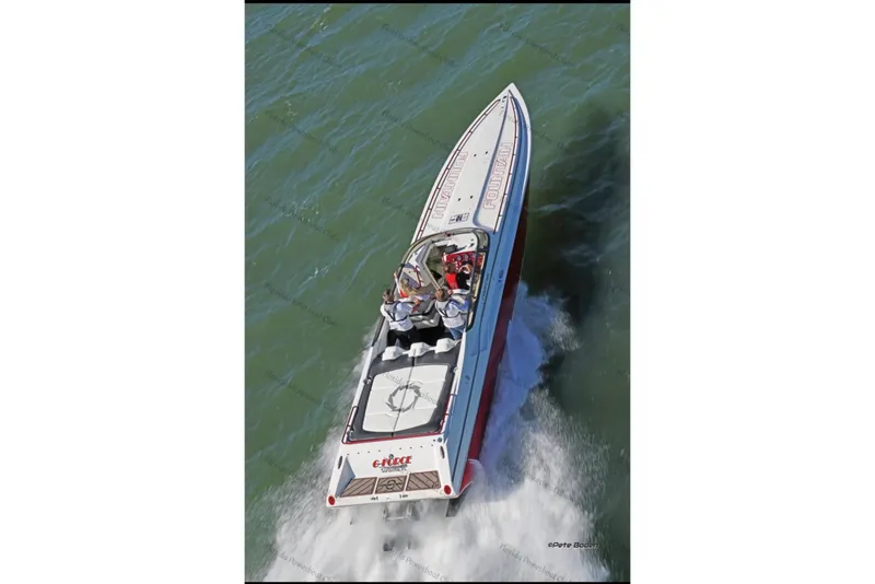 Slide: The Image of 2007 Fountain 42 Lightning speedboat cruising on open water. - 3