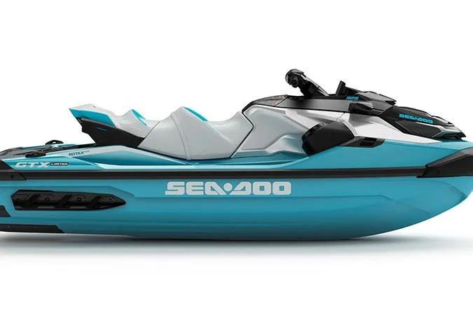 Slide: The Image of 2026 Sea-Doo GTX Limited 325 jet ski in sleek blue and gray design. - 1