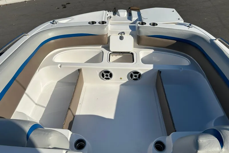 Slide: The Image of 2018 Hurricane Sundeck Sport 218 OB boat interior with seating and cup holders. - 14