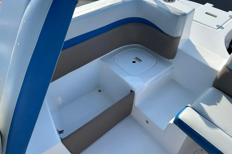 Slide: The Image of 2018 Hurricane Sundeck Sport 218 OB boat interior seating with storage compartment. - 16