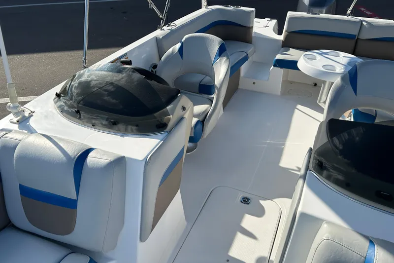 Slide: The Image of 2018 Hurricane Sundeck Sport 218 OB interior with seating and helm. - 9