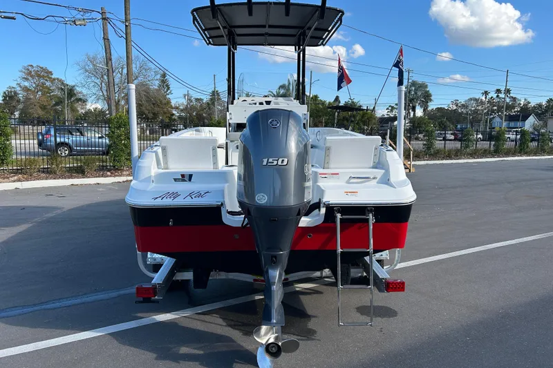 Slide: The Image of 2022 Wellcraft 202 Fisherman boat with Yamaha 150 engine, parked outdoors. - 3