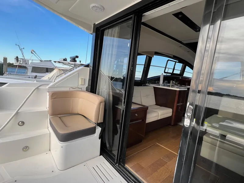 Slide: The Image of Luxurious interior of 2017 Sea Ray Sundancer 400 yacht with modern seating and decor. - 14