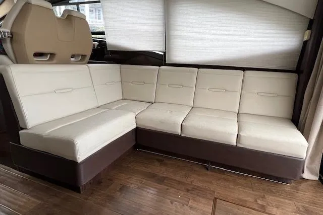 Slide: The Image of Luxurious interior of 2017 Sea Ray Sundancer 400 yacht with white leather seating. - 21