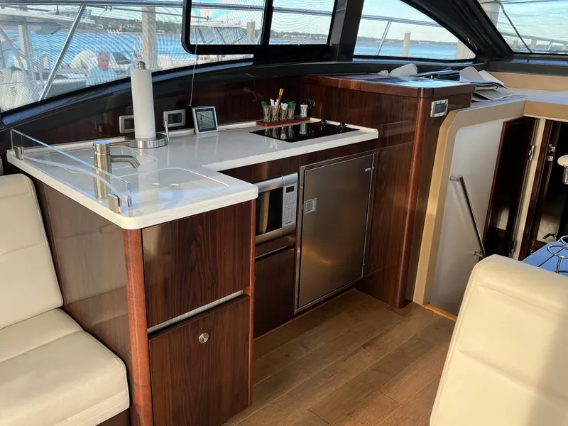 Slide: The Image of Luxurious interior of 2017 Sea Ray Sundancer 400 yacht with cream leather seating. - 23