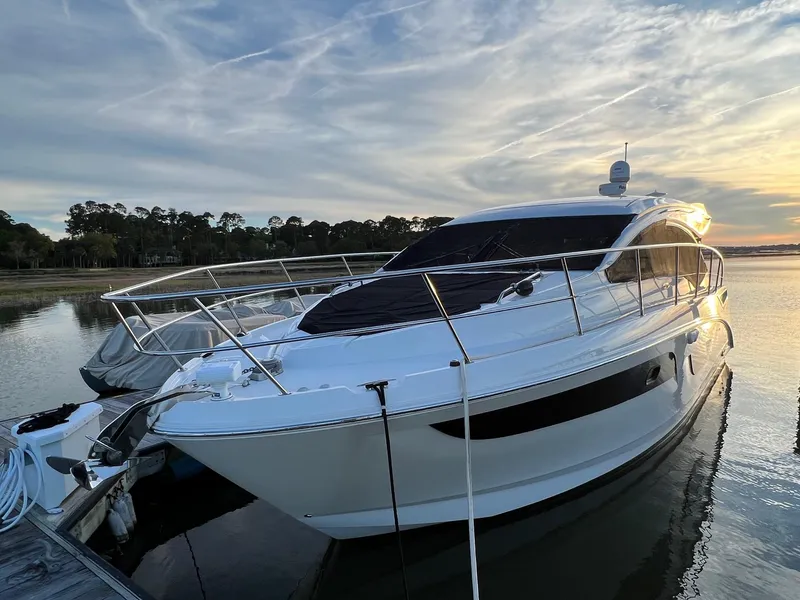 Slide: The Image of 2017 Sea Ray Sundancer 400 yacht docked at sunset. - 3