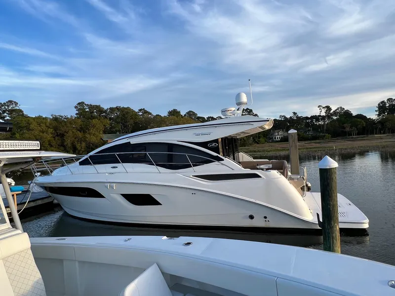 Slide: The Image of 2017 Sea Ray Sundancer 400 yacht docked at marina. - 4