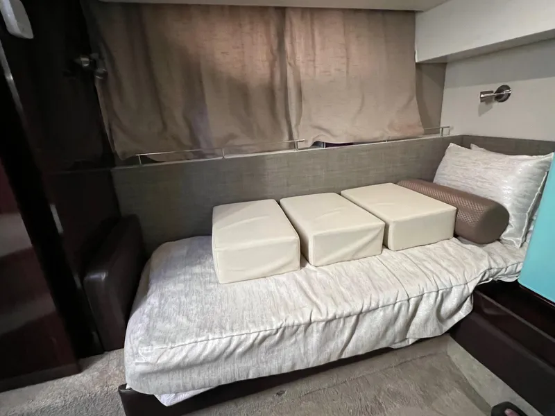 Slide: The Image of Interior cabin of 2017 Sea Ray Sundancer 400 with twin beds and modern decor. - 41