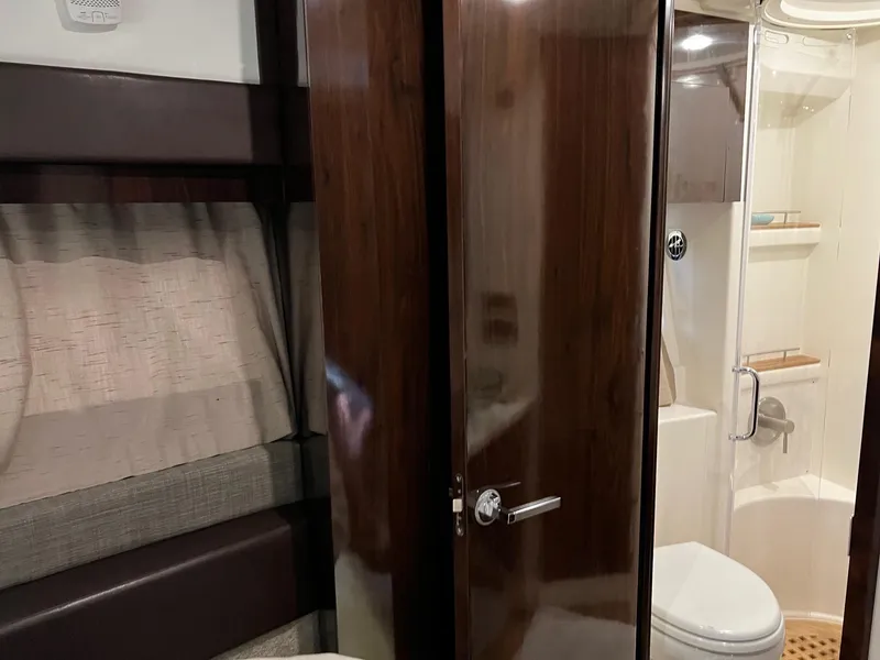 Slide: The Image of TV inside 2017 Sea Ray Sundancer 400 yacht interior. - 50