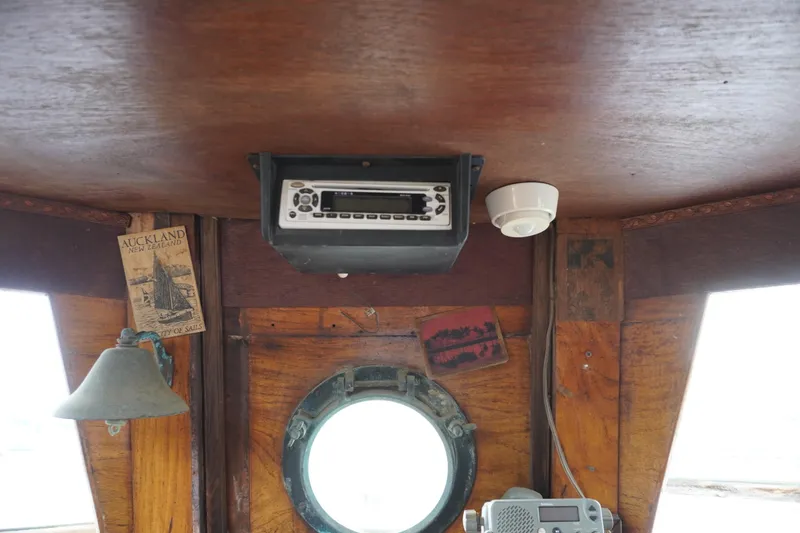 Slide: The Image of Interior of a 1976 Manila Shipbuilders sailboat with vintage decor and equipment. - 43