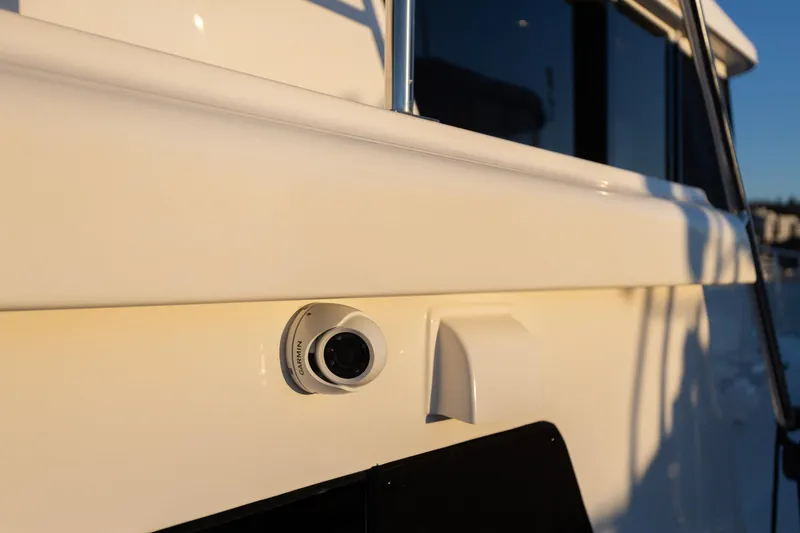 Slide: The Image of 2021 North Pacific 49 Pilothouse with Garmin camera on exterior. - 37