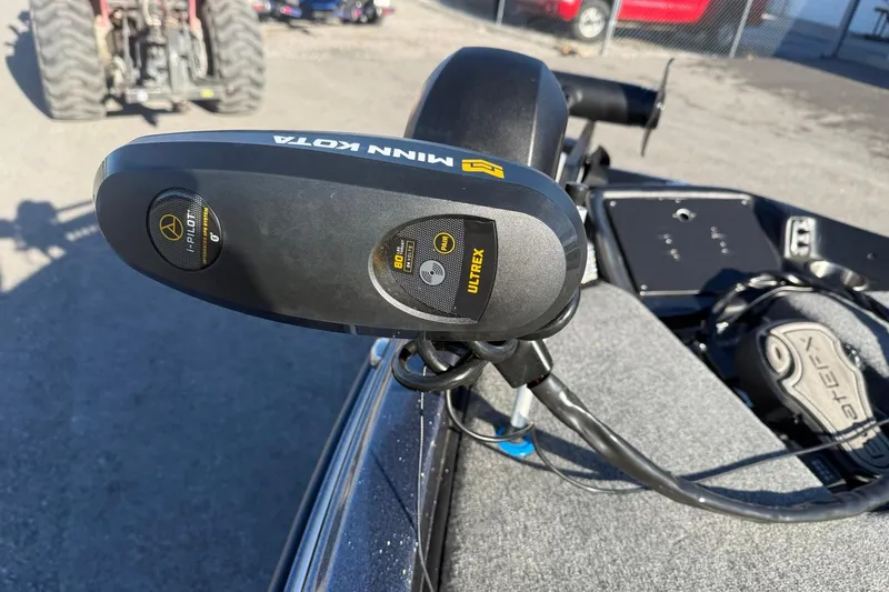 Slide: The Image of Minn Kota Ultrex trolling motor on 2021 Phoenix 818 Pro boat, outdoor setting. - 10