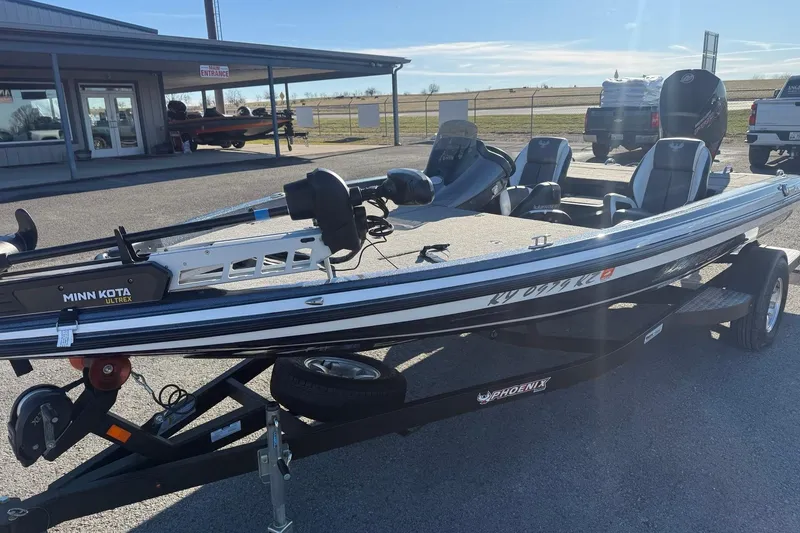 Slide: The Image of 2021 Phoenix 818 Pro boat with Minn Kota Ultrex motor on trailer. - 4