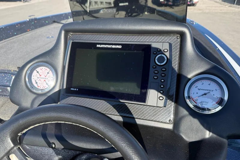 Slide: The Image of Dashboard of 2021 Phoenix 818 Pro boat with Humminbird Helix 9 display. - 6
