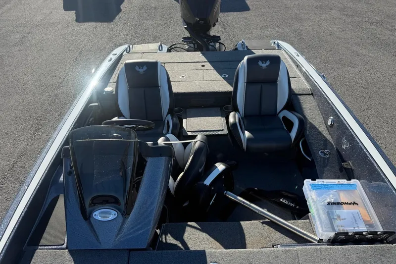 Slide: The Image of 2021 Phoenix 818 Pro boat interior with dual seats and steering console. - 8