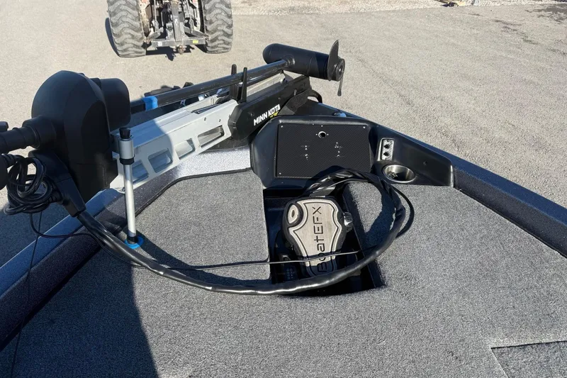 Slide: The Image of Phoenix 818 Pro 2021 boat with Minn Kota trolling motor on deck. - 9