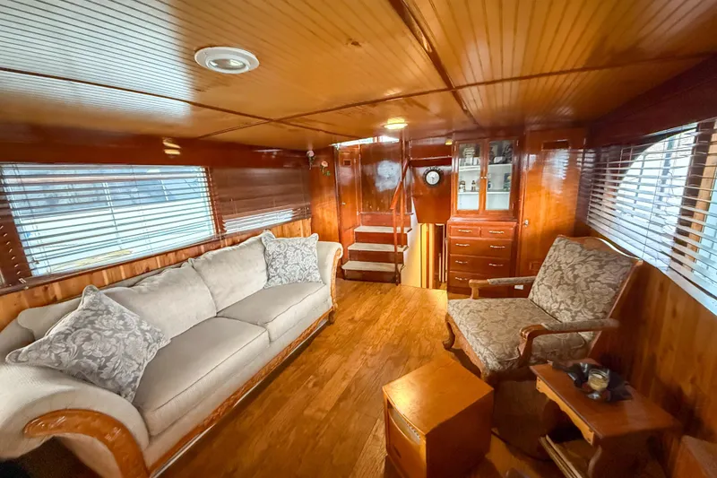 Slide: The Image of Luxurious 1956 Burger Pilothouse interior with elegant wood paneling and comfortable seating. - 28