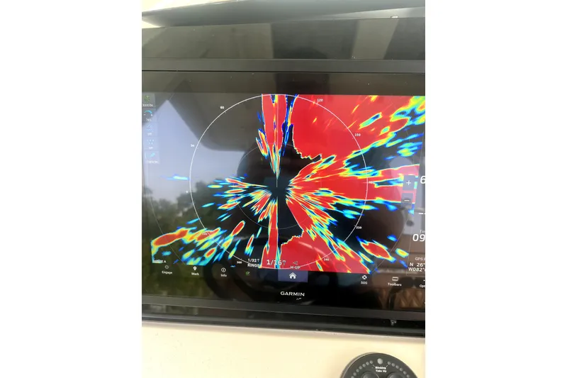 Slide: The Image of Garmin radar display on 2018 Scout 350 LXF boat, showing colorful navigation data. - 24