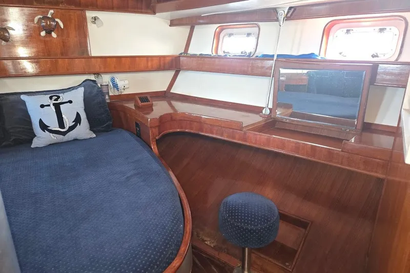 Slide: The Image of Cozy cabin interior of 1982 Tayana Center Cockpit Cutter Ketch with nautical decor. - 40