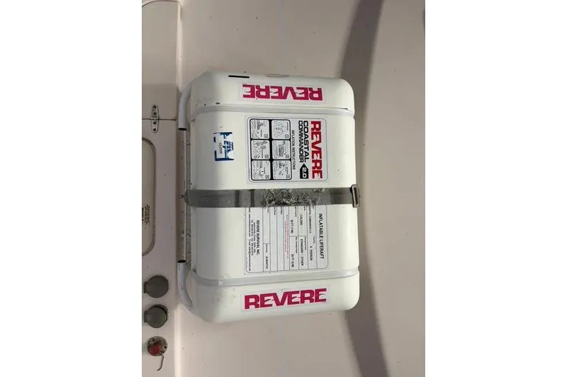 Slide: The Image of Revere Coastal Commander 2.0 life raft on 2013 Grady-White Express 330 boat. - 17